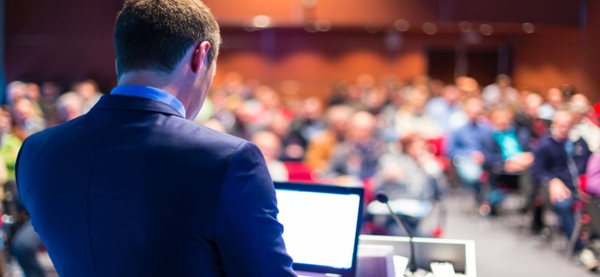 Man speaking at HR Tech Conference