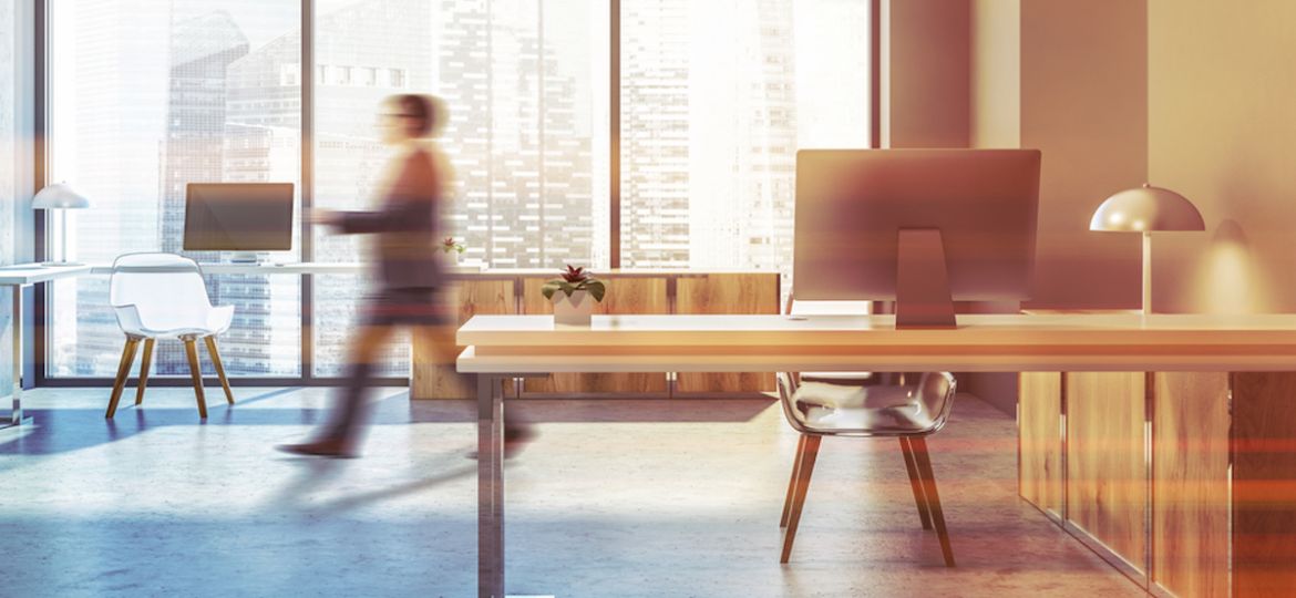 Businessman in an HR career walking in a office place.