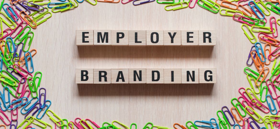 Employer branding words concept on cubes, showing where marketing and HR meet.