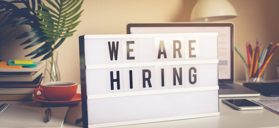 We are hiring text sign on desk, trying out new strategy for hiring boomerang employees.